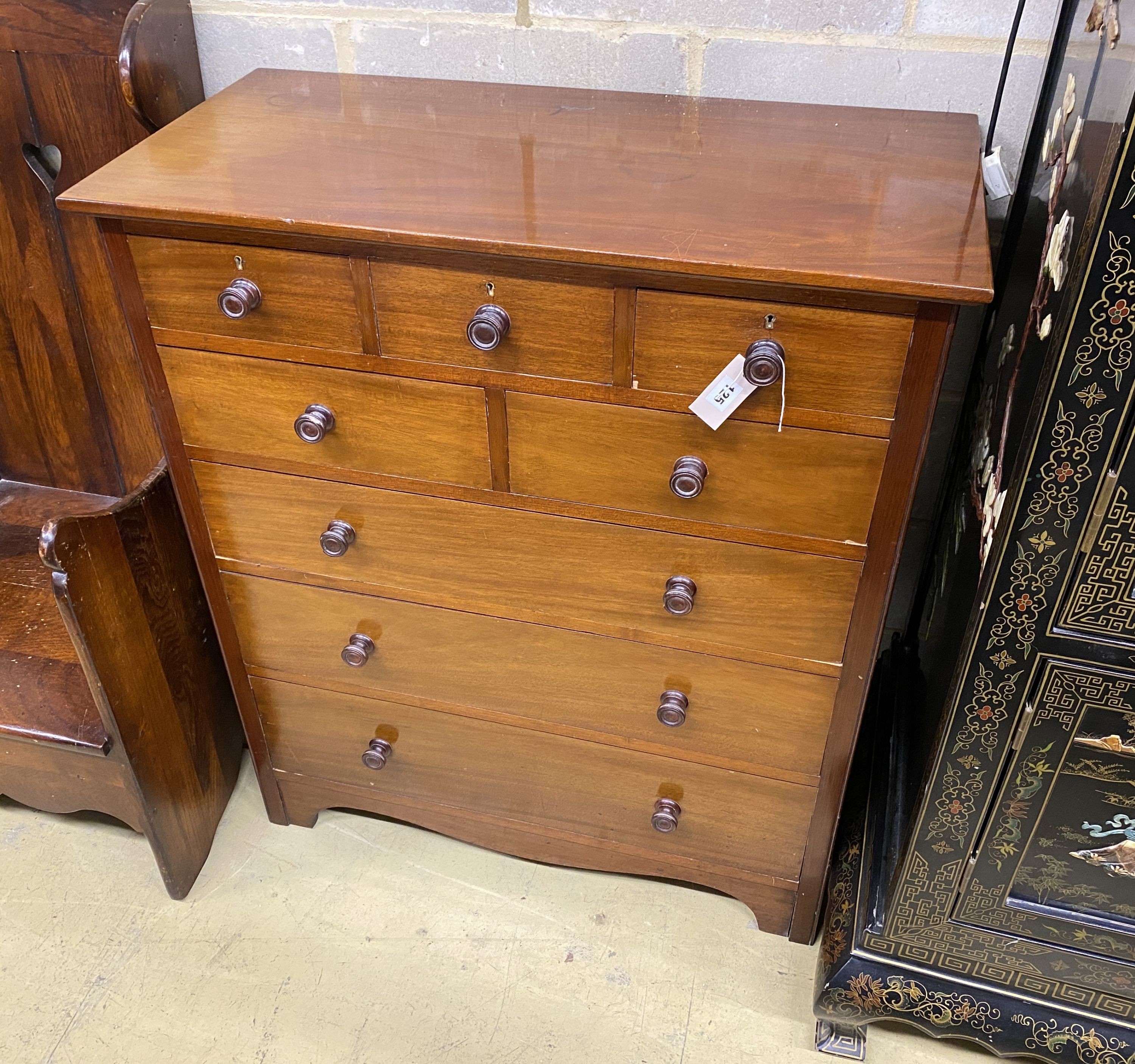 An Edwardian mahogany chest, stamped Flashman & Co., width 92cm, depth 45cm, height 107cm